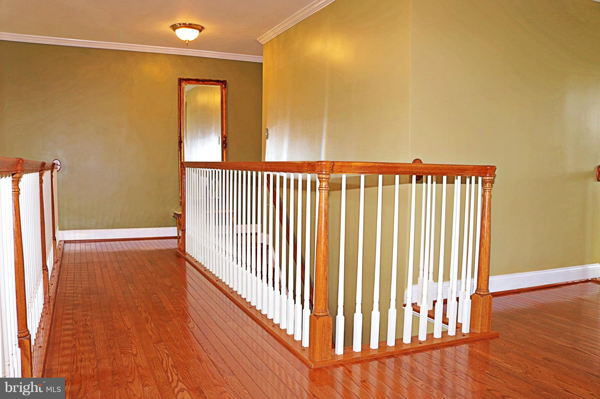 517 Rudder Road Shepherdstown, WV 25443 - Photo 15 of 25 a view of a room with wooden floor and windows