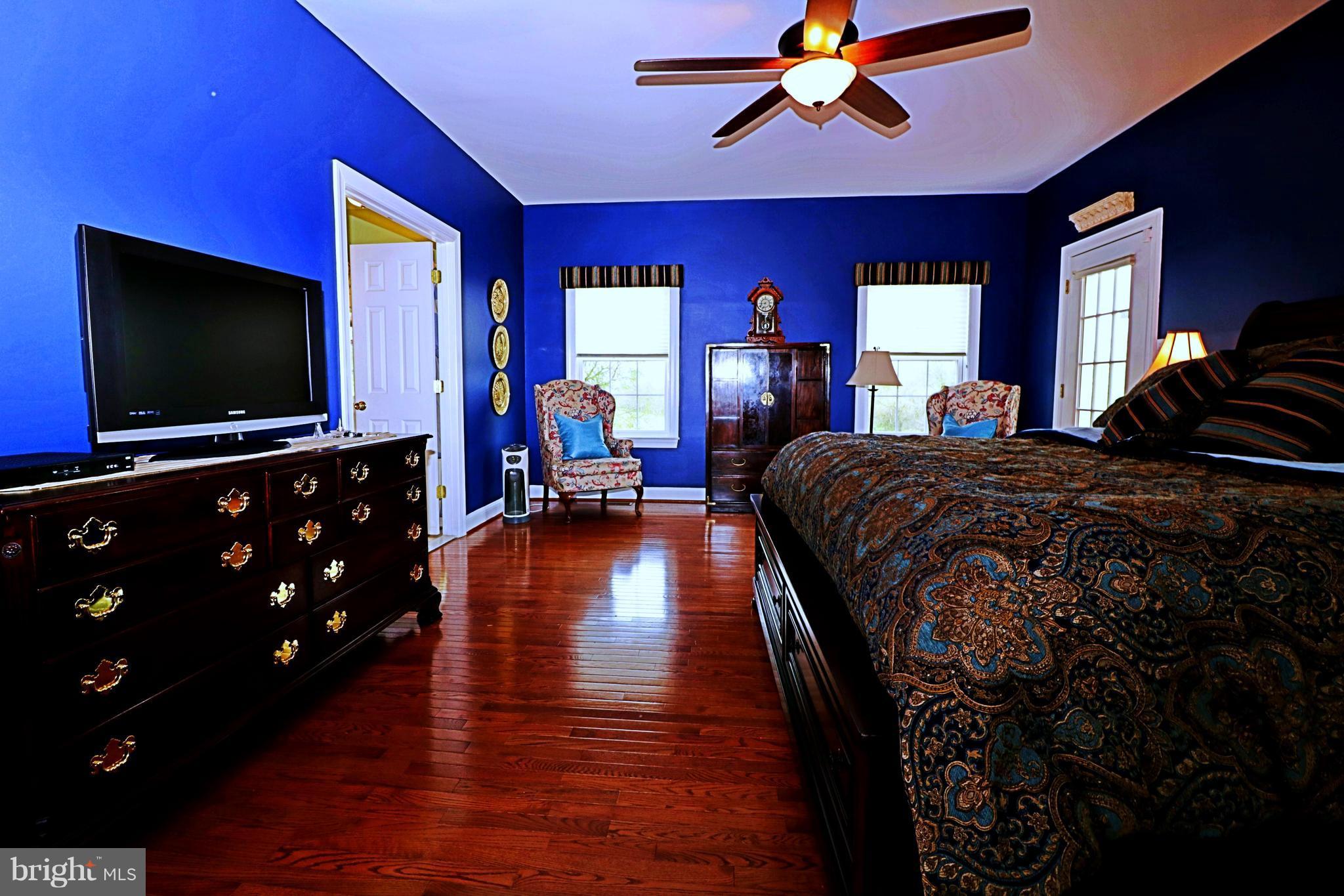 517 Rudder Road Shepherdstown, WV 25443 - Photo 16 of 25 a living room with furniture and a flat screen tv