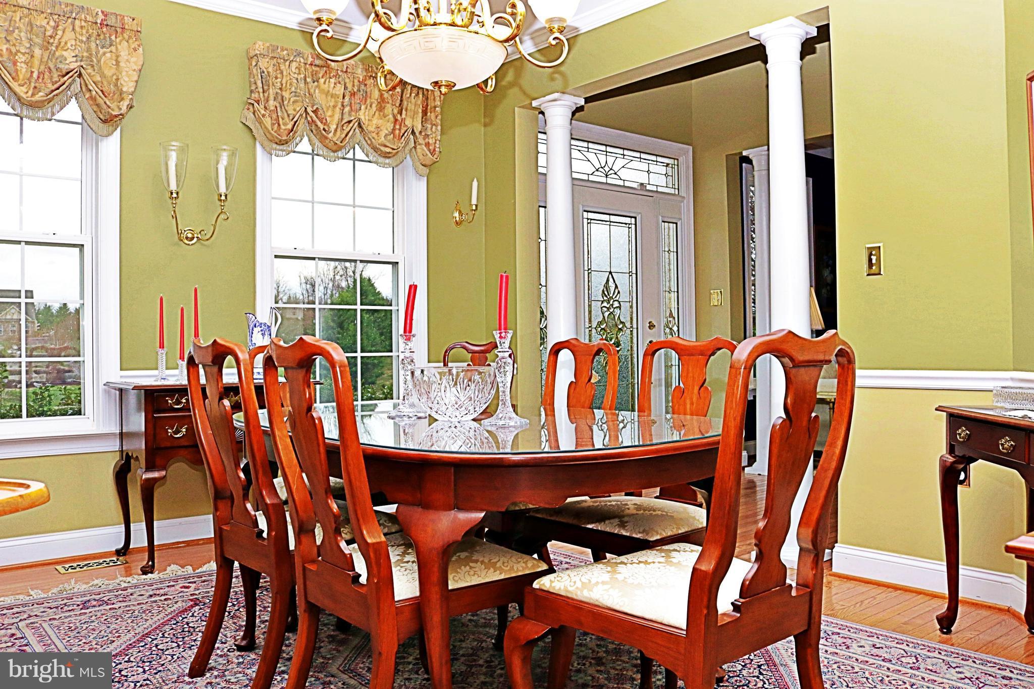 517 Rudder Road Shepherdstown, WV 25443 - Photo 4 of 25 a view of a dining room with furniture and chandelier