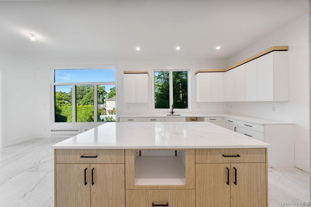 40 Singer Avenue, Unit 201 Spring Valley, NY 10977 - Photo 14 of 50 a kitchen with a sink and a window