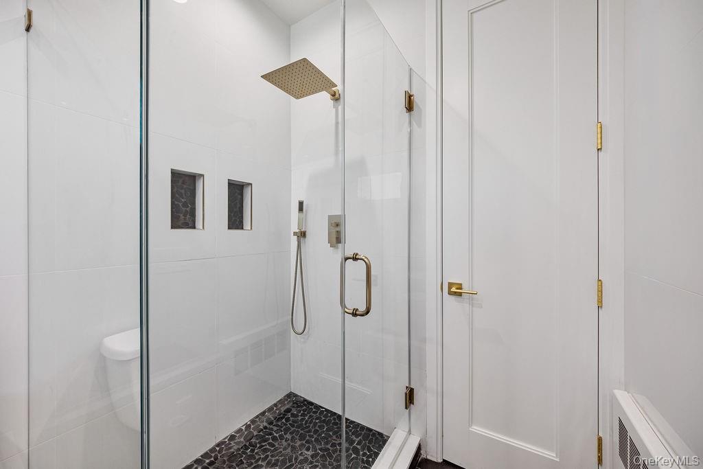 40 Singer Avenue, Unit 201 Spring Valley, NY 10977 - Photo 25 of 50 a bathroom with a shower