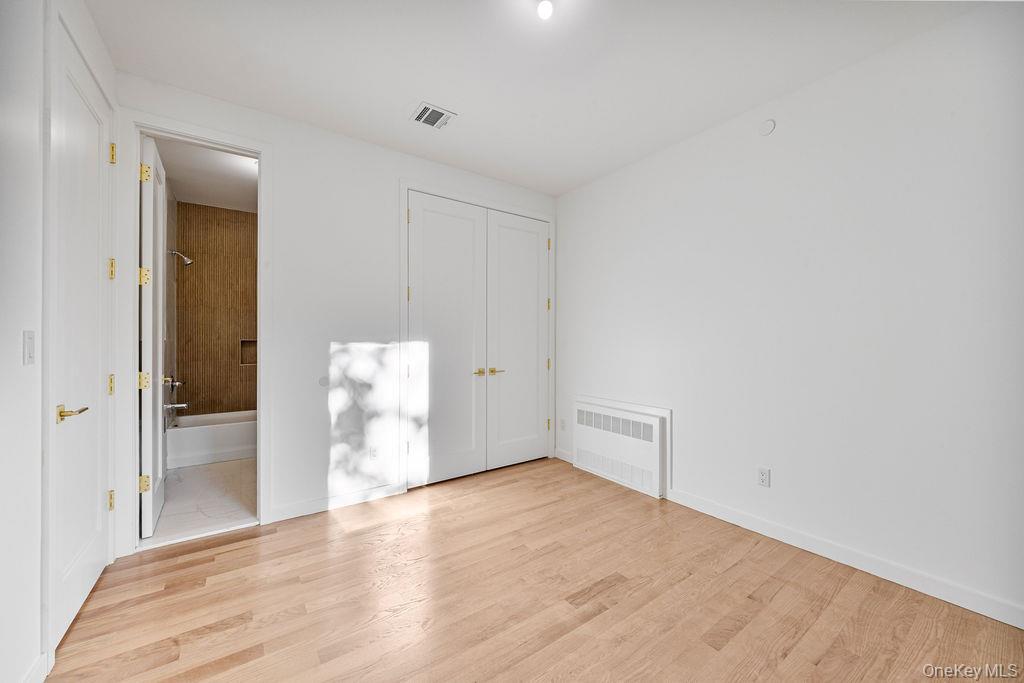 40 Singer Avenue, Unit 201 Spring Valley, NY 10977 - Photo 34 of 50 wooden floor in an empty room