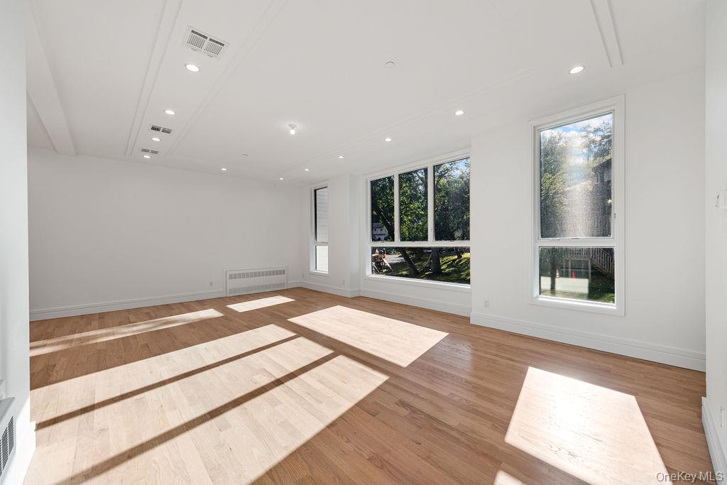 40 Singer Avenue, Unit 201 Spring Valley, NY 10977 - Photo 8 of 50 a view of an empty room with a window