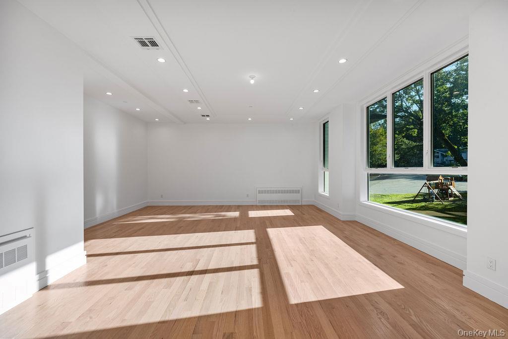 40 Singer Avenue, Unit 201 Spring Valley, NY 10977 - Photo 9 of 50 a view of an empty room with a window