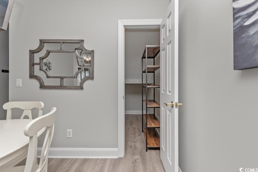 110 Cart Crossing Drive, Unit 102 Conway, SC 29526 - Photo 11 of 39 Office area with light wood-style flooring and baseboards