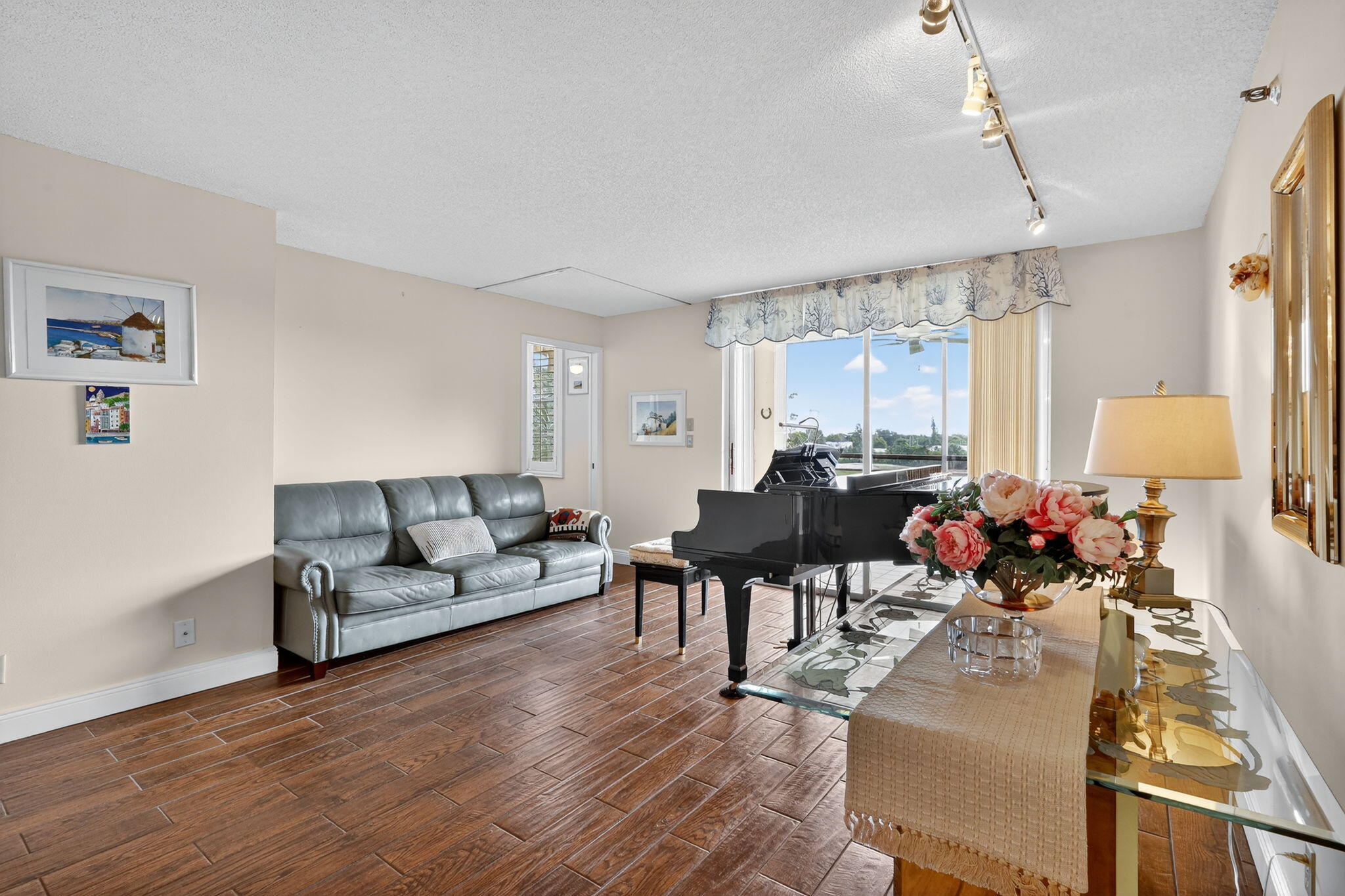 5340 Northwest 2nd Avenue, Unit 421 Boca Raton, FL 33487 - Photo 15 of 54 a living room with furniture and a large window