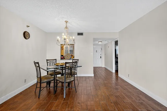 a bedroom with a bed and a table in it