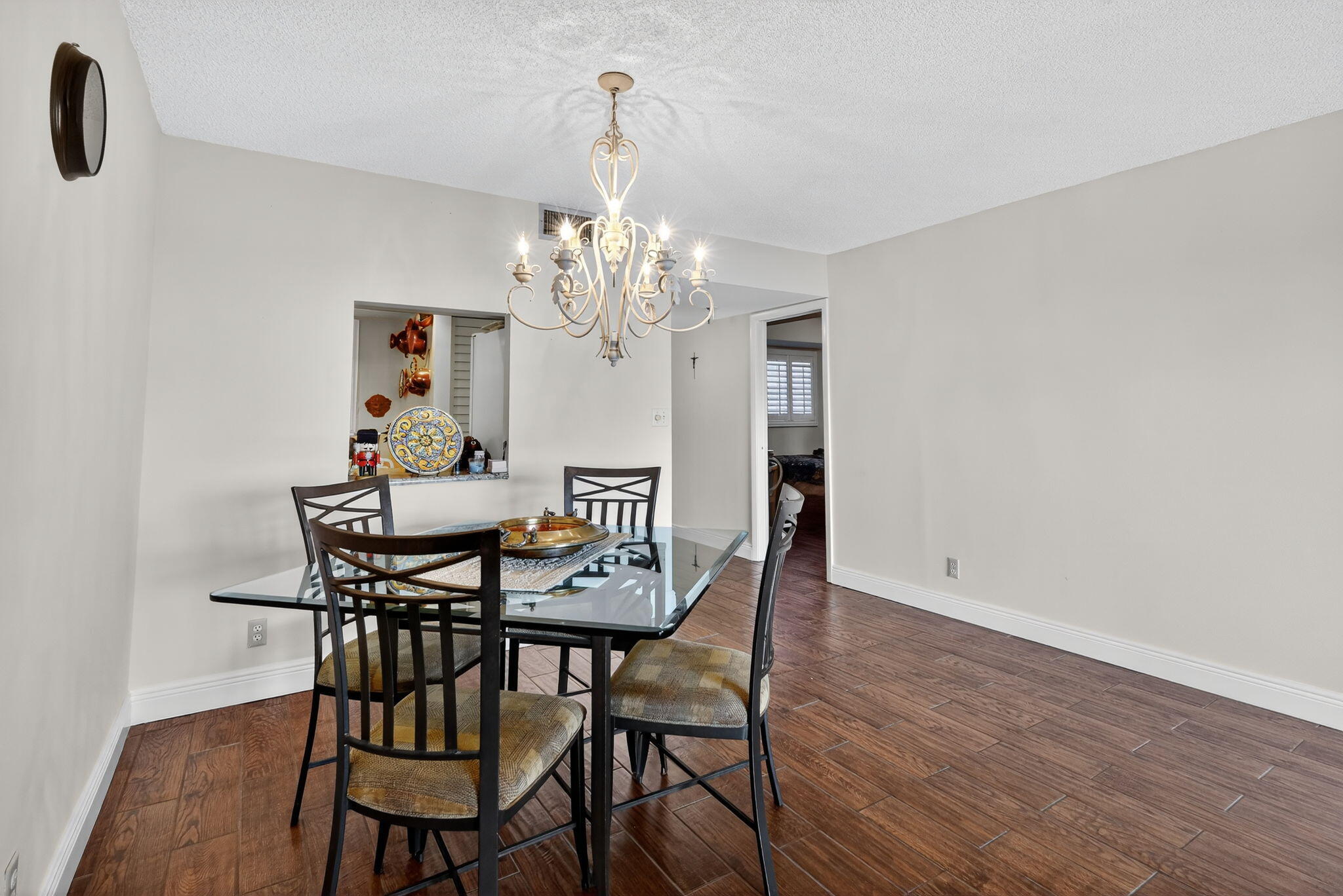 5340 Northwest 2nd Avenue, Unit 421 Boca Raton, FL 33487 - Photo 20 of 54 a view of a dining room with furniture and wooden floor