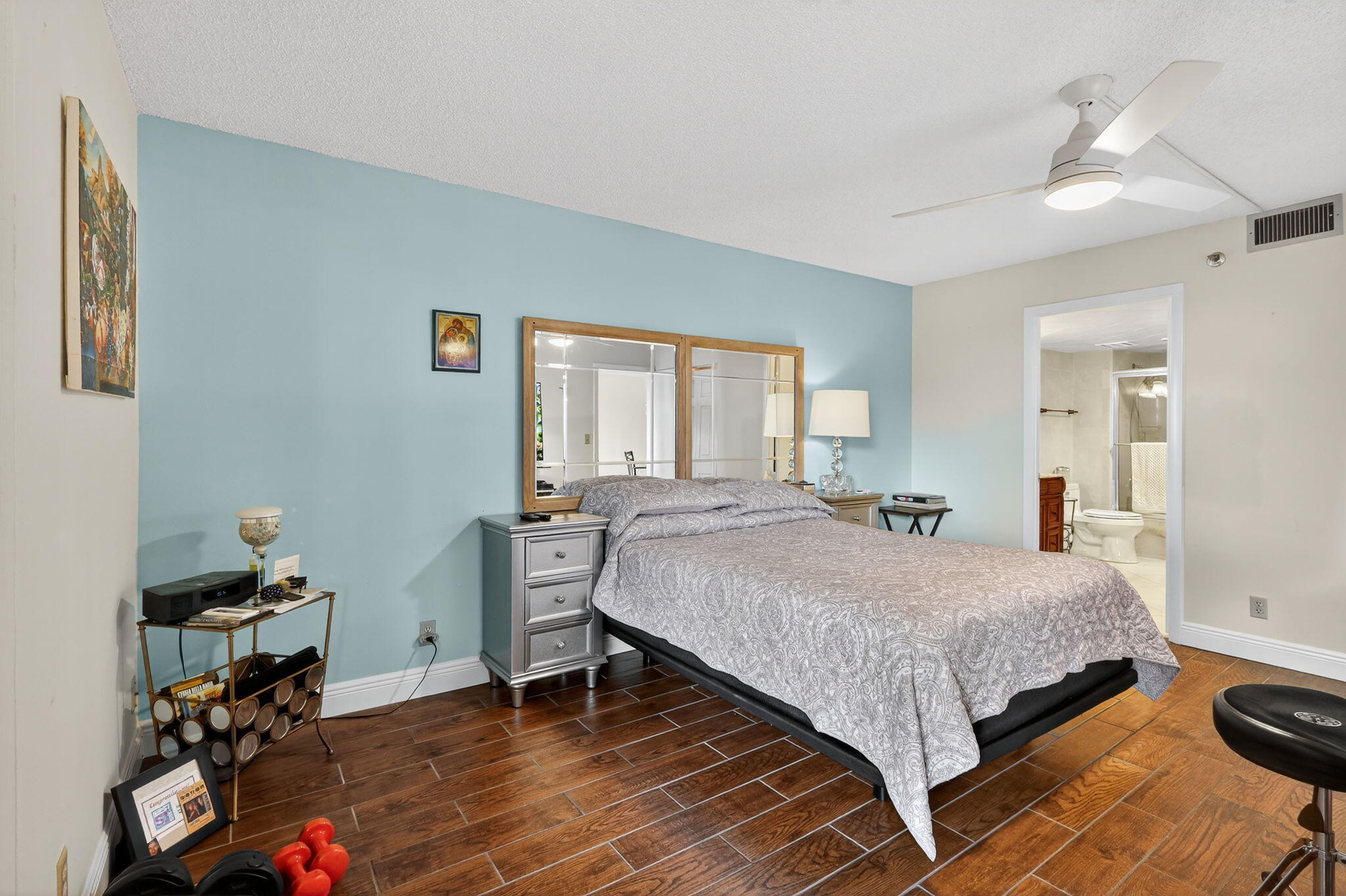 5340 Northwest 2nd Avenue, Unit 421 Boca Raton, FL 33487 - Photo 23 of 54 a bedroom with a bed and a table in it