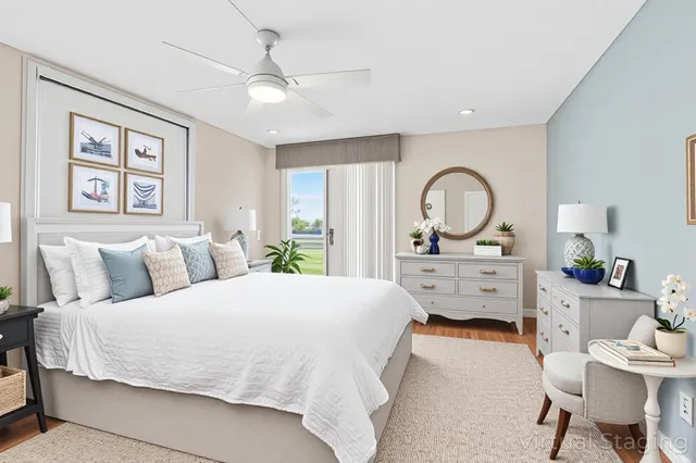 a bedroom with bed and a window