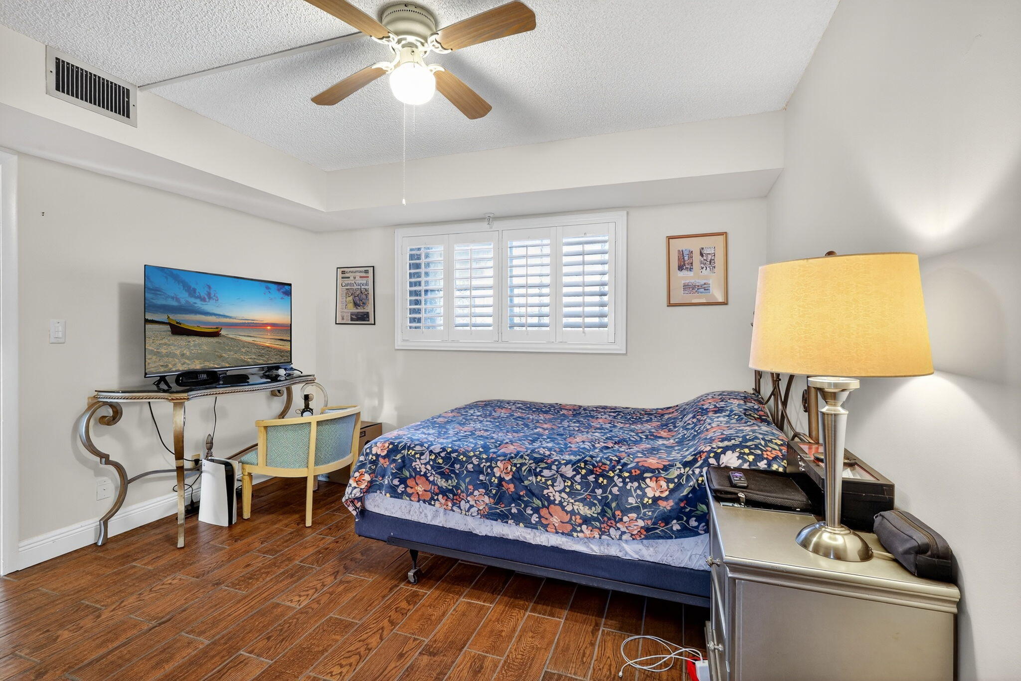5340 Northwest 2nd Avenue, Unit 421 Boca Raton, FL 33487 - Photo 32 of 54 a living room with furniture and a flat screen tv