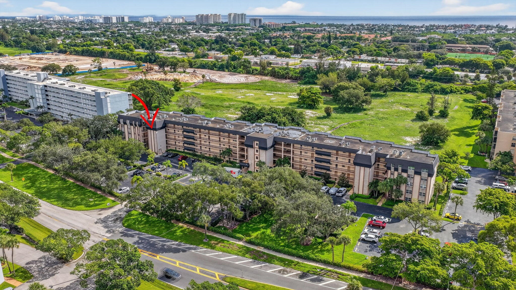 5340 Northwest 2nd Avenue, Unit 421 Boca Raton, FL 33487 - Photo 42 of 54 a view of a city with lush green forest