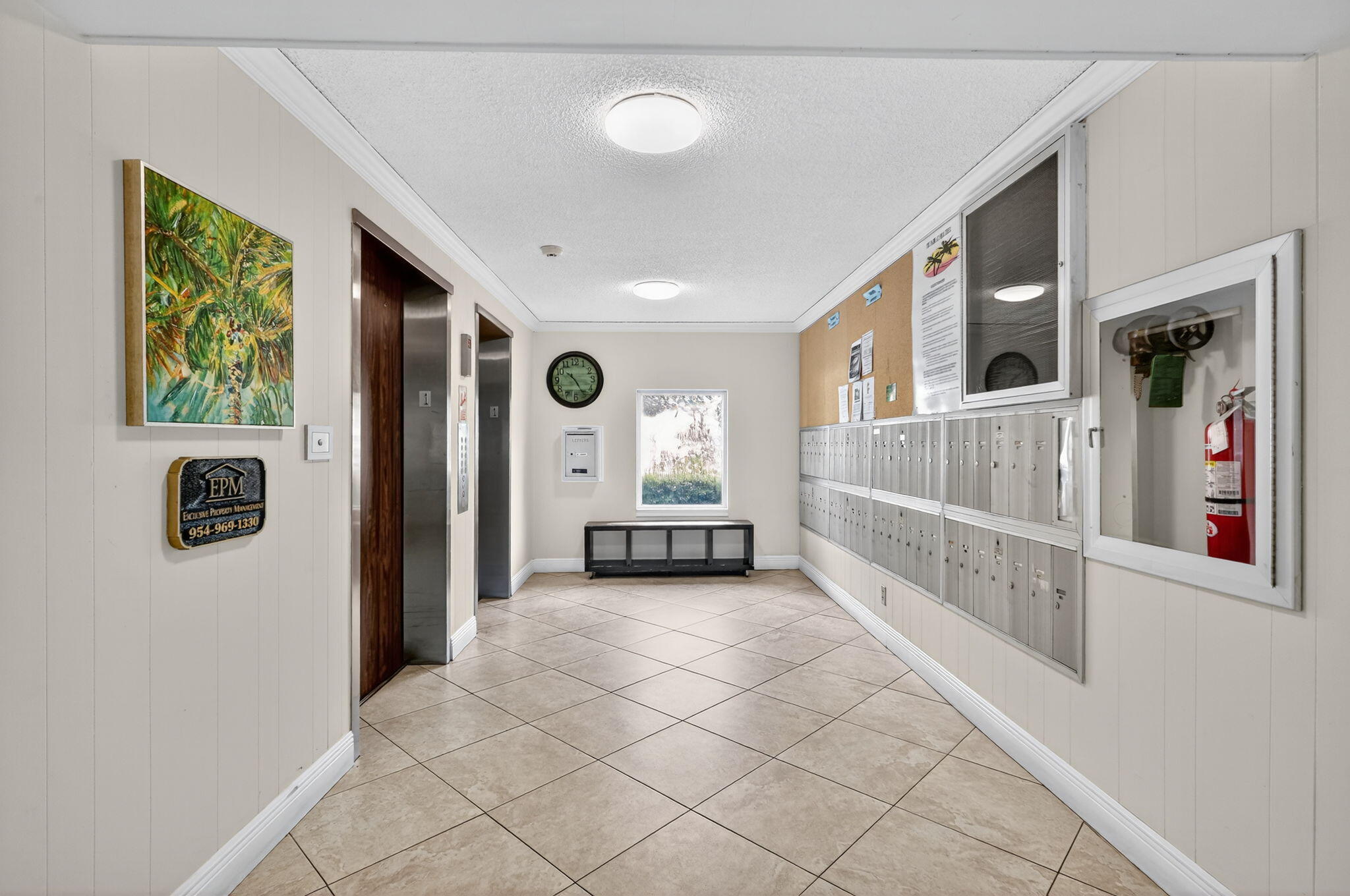 5340 Northwest 2nd Avenue, Unit 421 Boca Raton, FL 33487 - Photo 53 of 54 a view of a hallway with a window and stairs