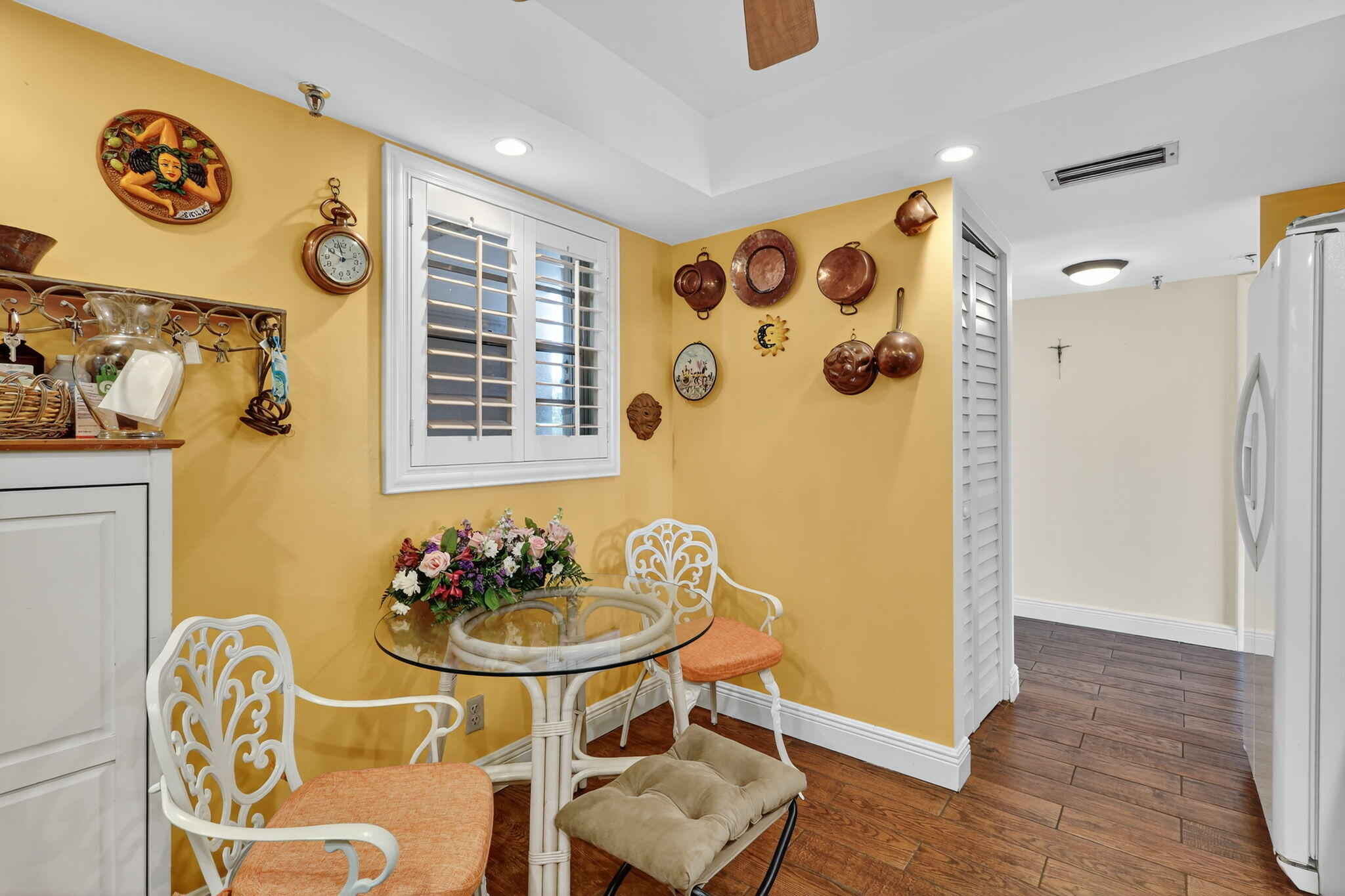 5340 Northwest 2nd Avenue, Unit 421 Boca Raton, FL 33487 - Photo 6 of 54 a dining room with furniture and wooden floor