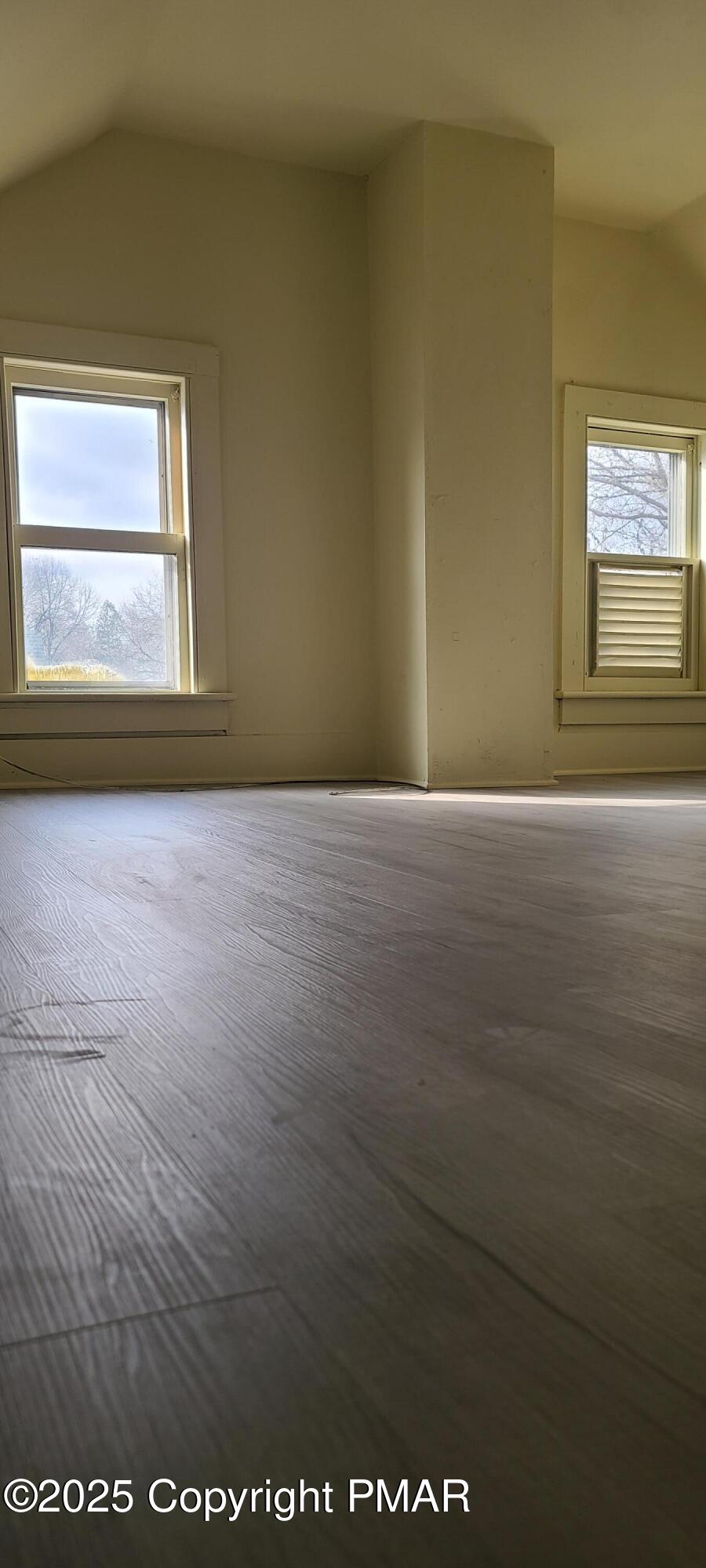 722 Monroe Street Stroudsburg, PA 18360 - Photo 9 of 11 an empty room with windows