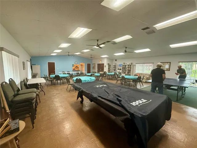 a view of a living room and dining room