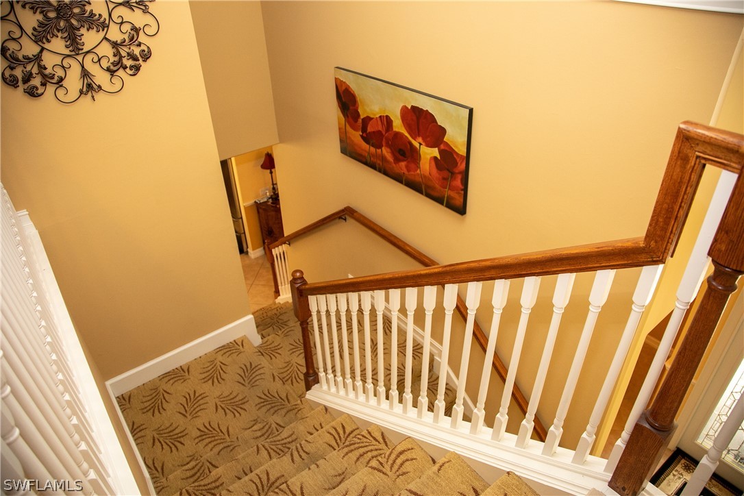 4345 Mistlethrush Lane Naples, FL 34119 - Photo 16 of 29 a view of a hallway