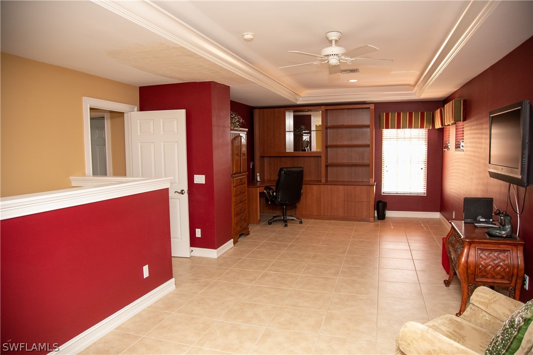 4345 Mistlethrush Lane Naples, FL 34119 - Photo 19 of 29 a workspace with furniture and window