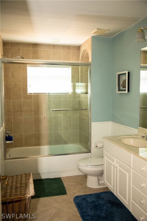 4345 Mistlethrush Lane Naples, FL 34119 - Photo 20 of 29 a bathroom with a sink a toilet and shower