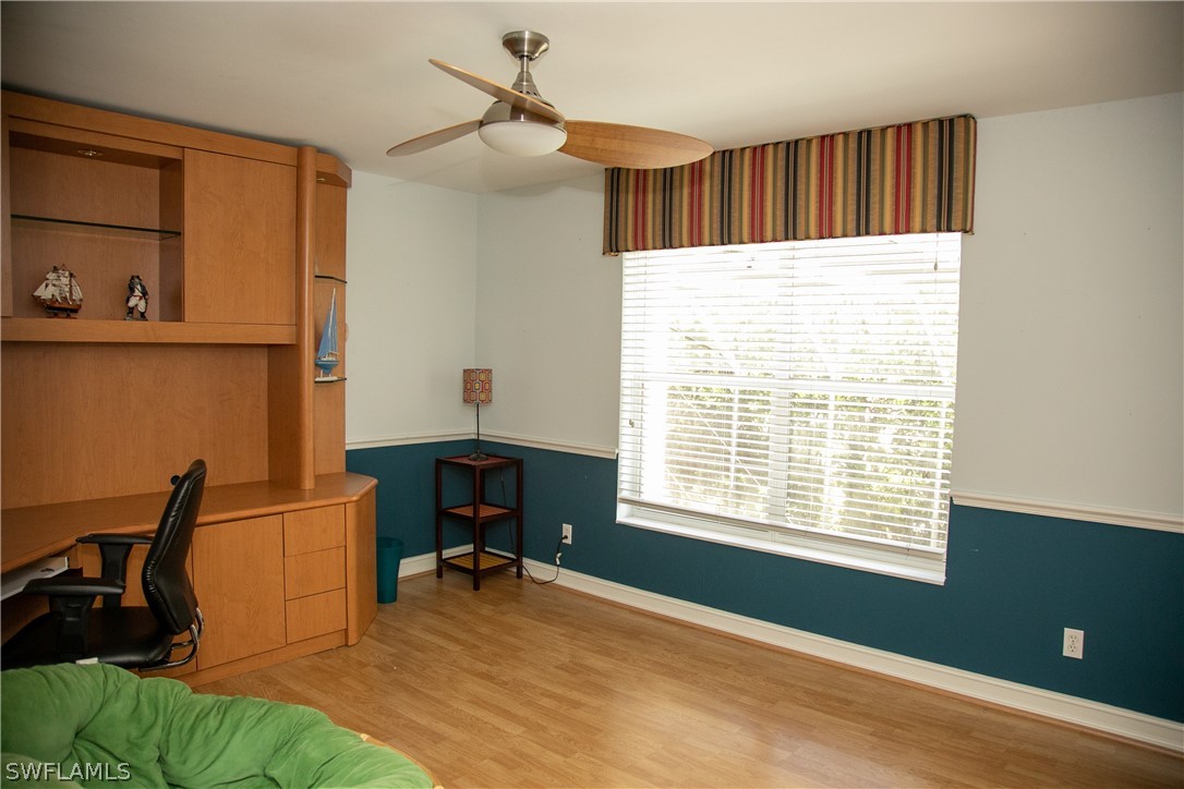 4345 Mistlethrush Lane Naples, FL 34119 - Photo 22 of 29 a workspace with furniture and a window