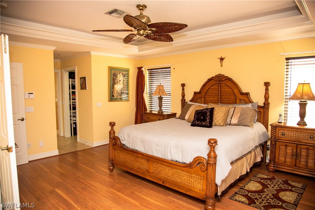 4345 Mistlethrush Lane Naples, FL 34119 - Photo 28 of 29 a bedroom with a bed and window