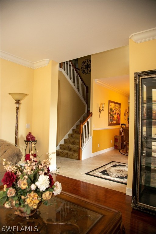 4345 Mistlethrush Lane Naples, FL 34119 - Photo 7 of 29 a view of a living room and a floor to ceiling window
