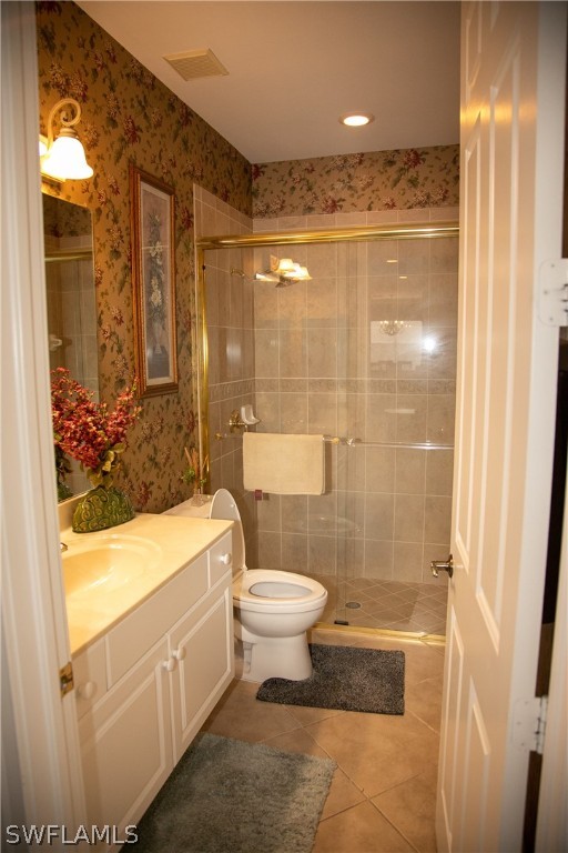 4345 Mistlethrush Lane Naples, FL 34119 - Photo 10 of 29 a bathroom with a sink toilet and shower