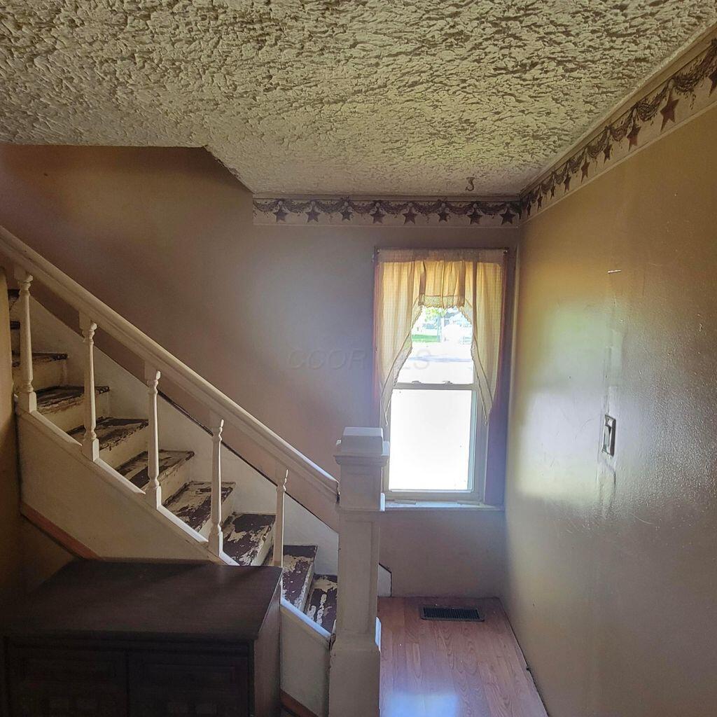 3813 North Old State Road Delaware, OH 43015 - Photo 10 of 18 Stairway leads to bedrooms
