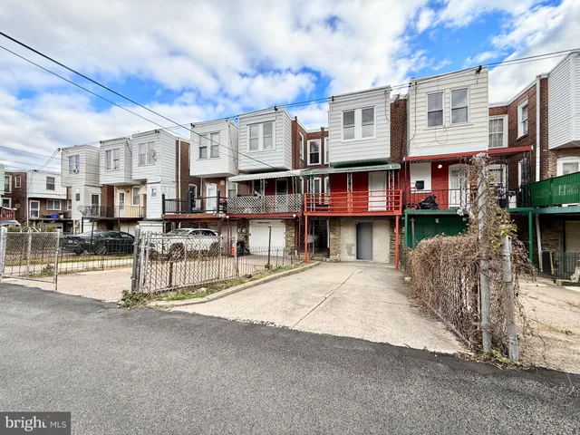 a view of a city street with cars
