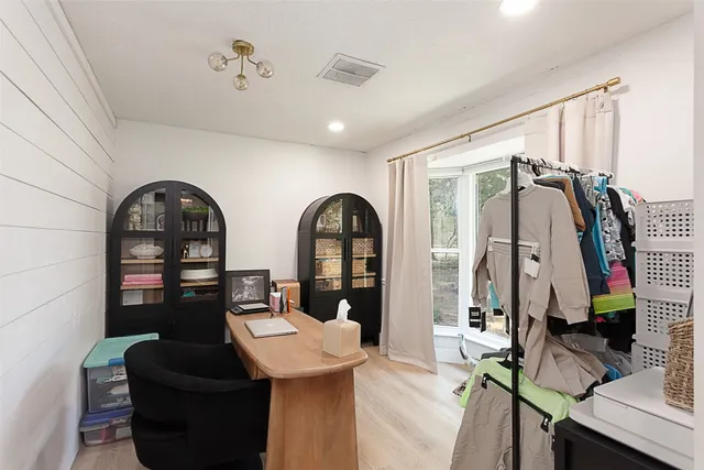 a view of living room with furniture and window