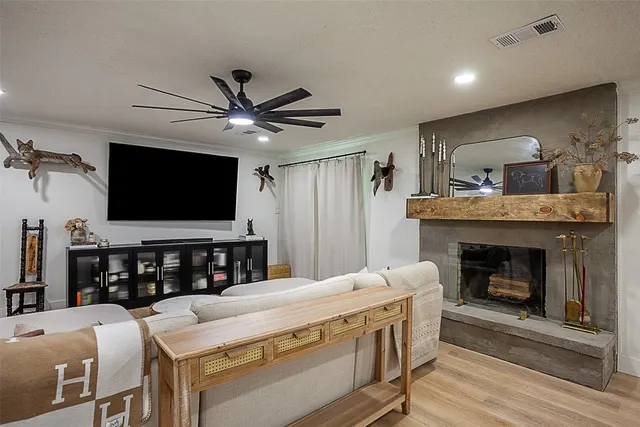 a kitchen with a stove and a fireplace