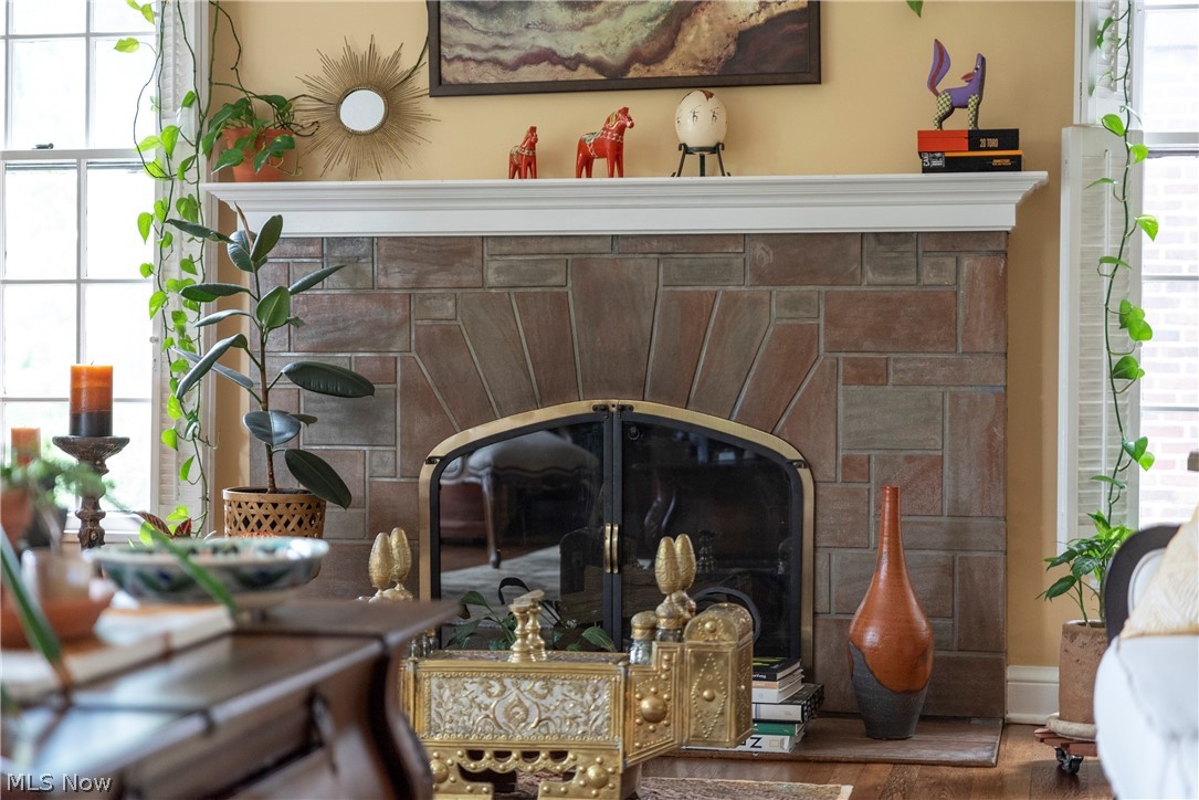 3349 Elsmere Road Cleveland, OH 44120 - Photo 8 of 50 Interior details featuring a fireplace and wood-type flooring