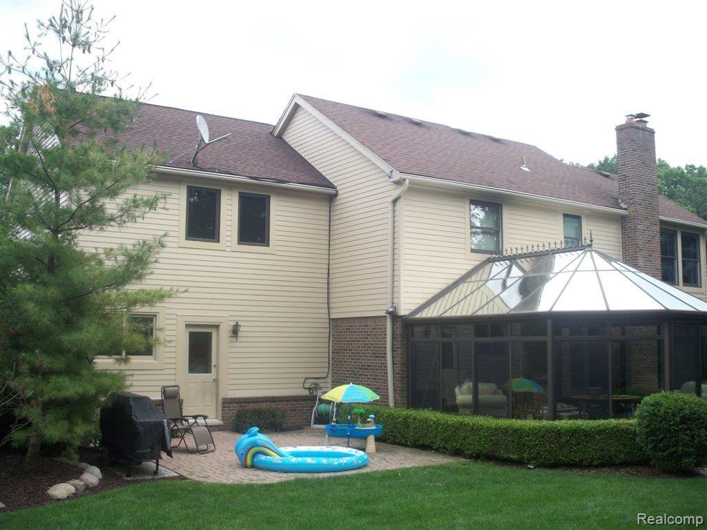 33828 York Ridge Street Farmington, MI 48331 - Photo 2 of 21 Rear home 008.JPG