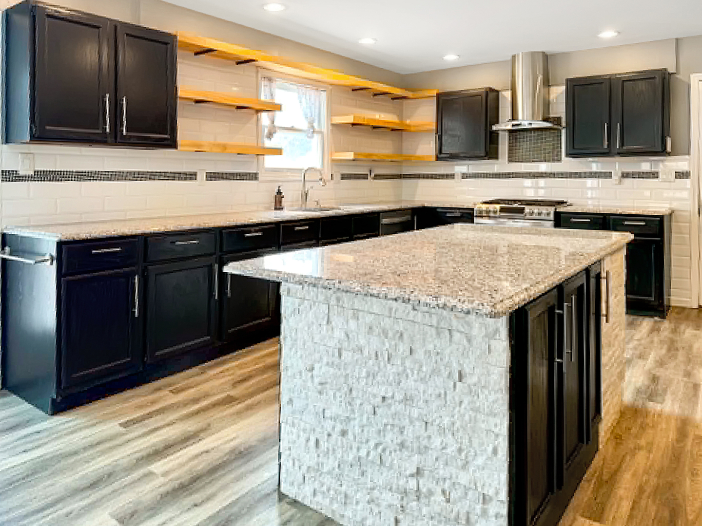 1008 Ascot Drive Rantoul, IL 61866 - Photo 11 of 24 a kitchen with stainless steel appliances granite countertop a sink and a stove top oven