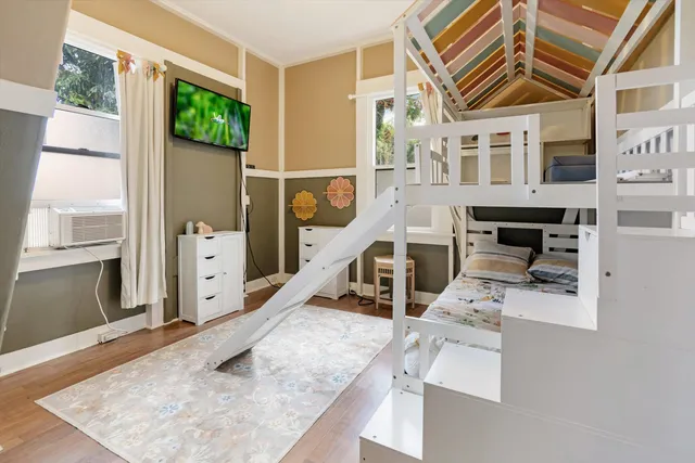 a view of a livingroom with furniture and a fireplace