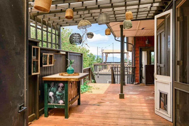 a view of a building with sitting area