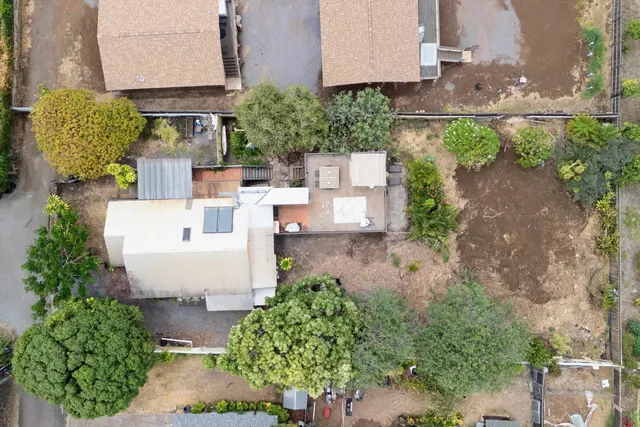 an aerial view of a house with garden