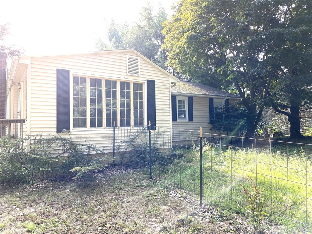 463 Bailey Road, Unit 1 Holden, MA 01520 - Photo 3 of 18 a view of a house with backyard