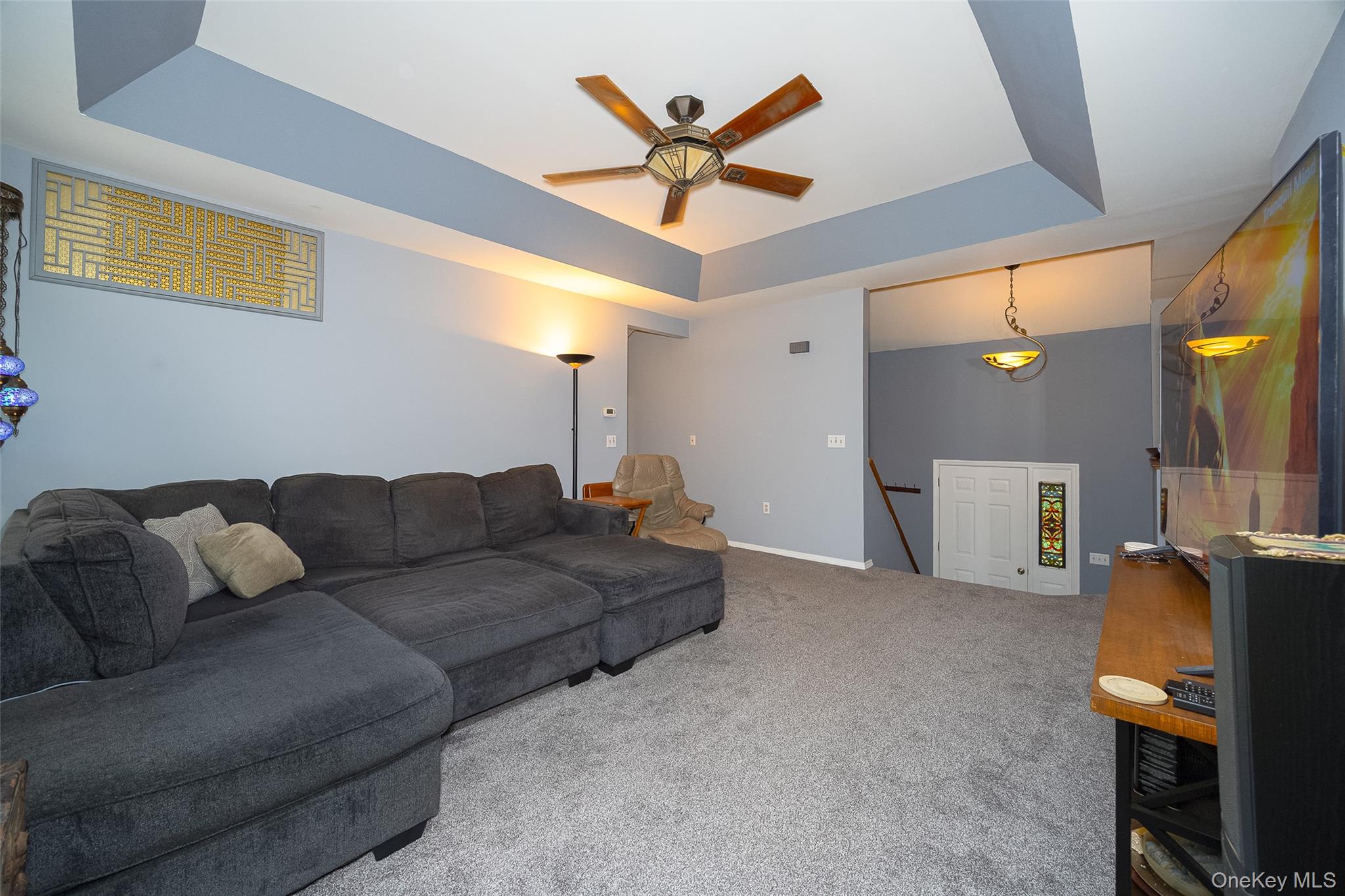 164 Bohl Road Hopewell Junction, NY 12533 - Photo 10 of 30 a living room with furniture and ceiling fan
