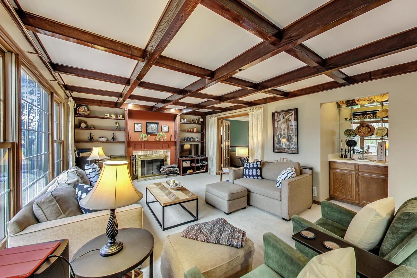 2185 Maplewood Drive Gurnee, IL 60031 - Photo 18 of 65 a living room with furniture and a wooden floor