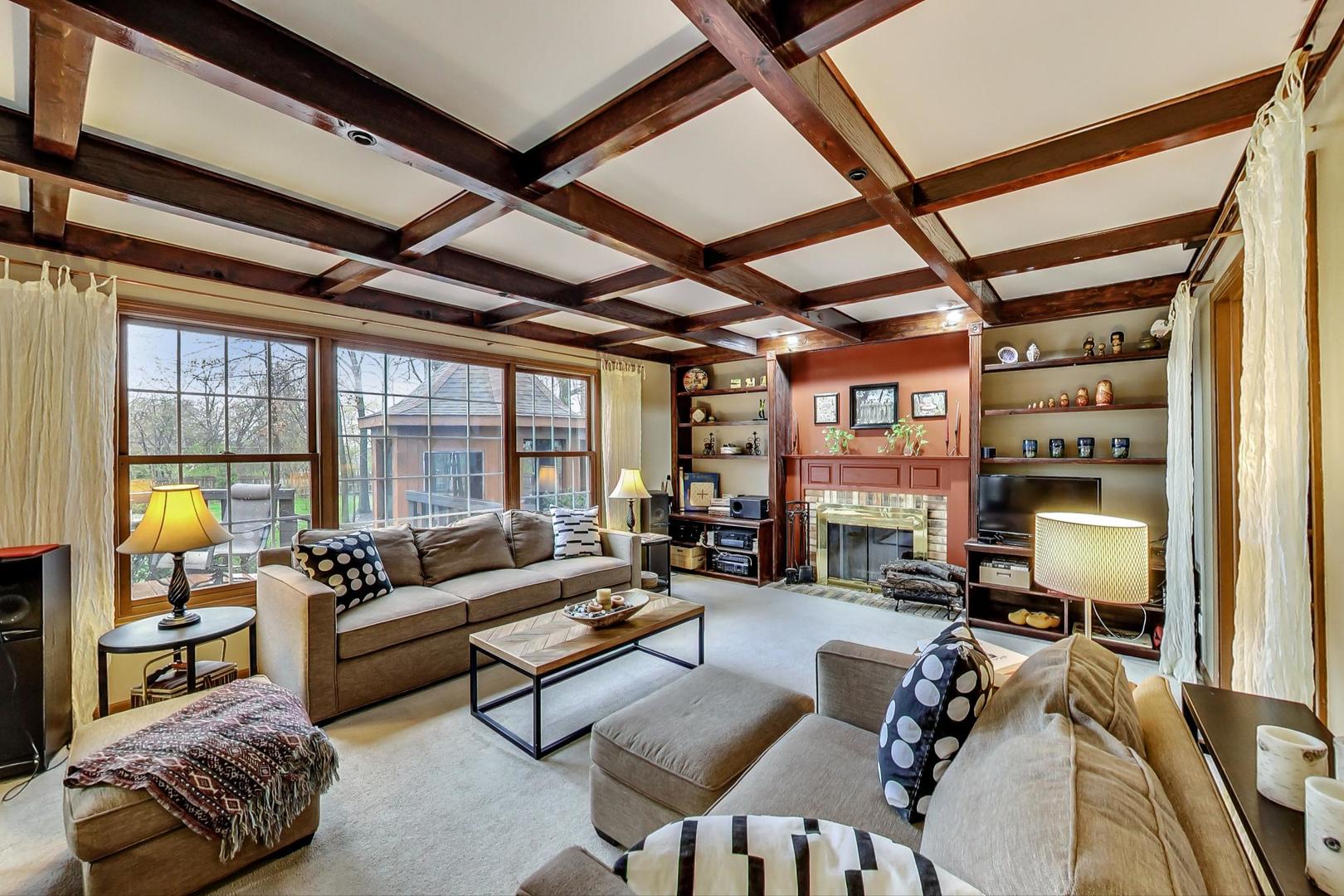 2185 Maplewood Drive Gurnee, IL 60031 - Photo 19 of 65 a living room with furniture and a large window