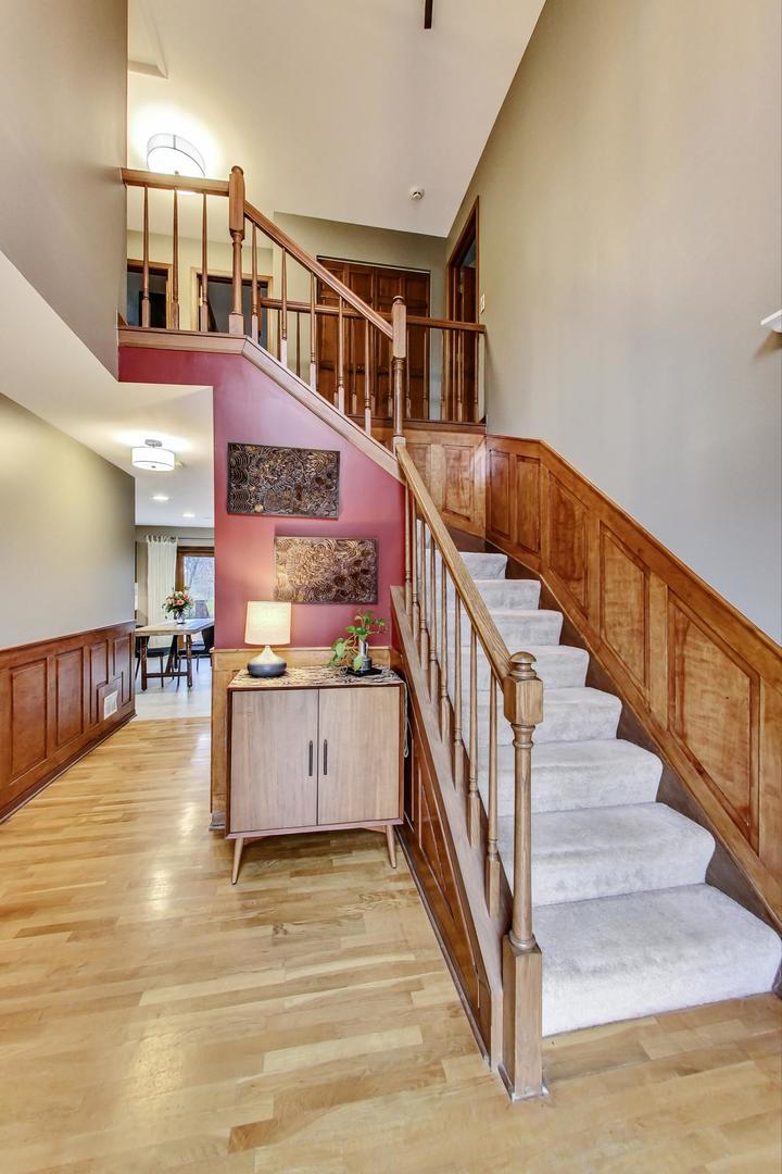 2185 Maplewood Drive Gurnee, IL 60031 - Photo 3 of 65 a view of an entryway with wooden floor