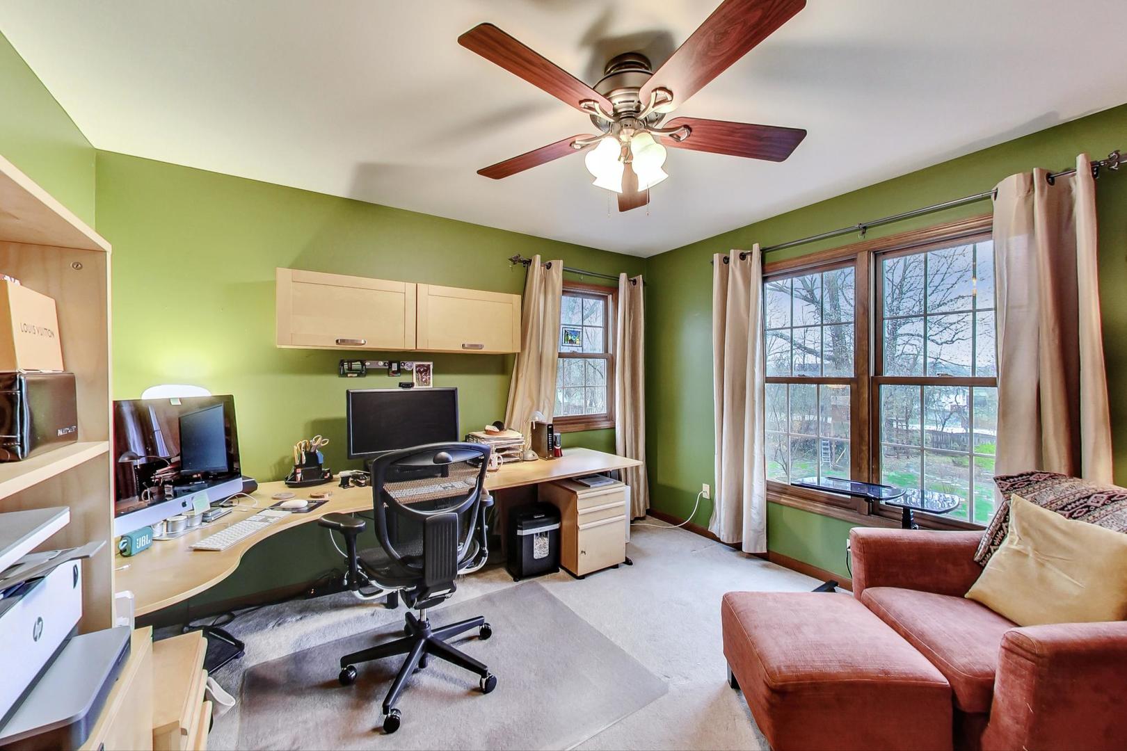 2185 Maplewood Drive Gurnee, IL 60031 - Photo 36 of 65 a view of a livingroom with workspace and a window