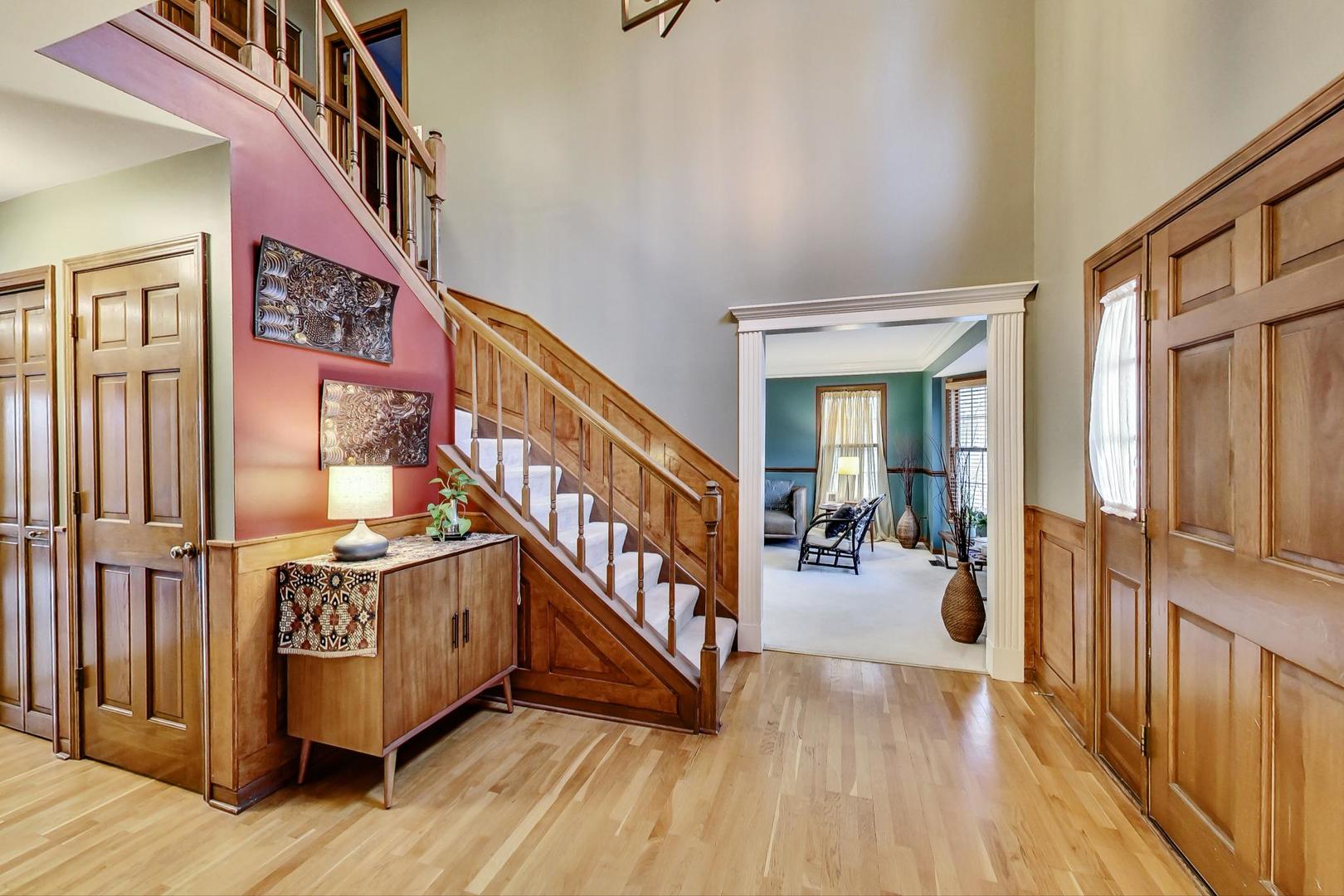 2185 Maplewood Drive Gurnee, IL 60031 - Photo 4 of 65 a view of an entryway wooden floor and windows