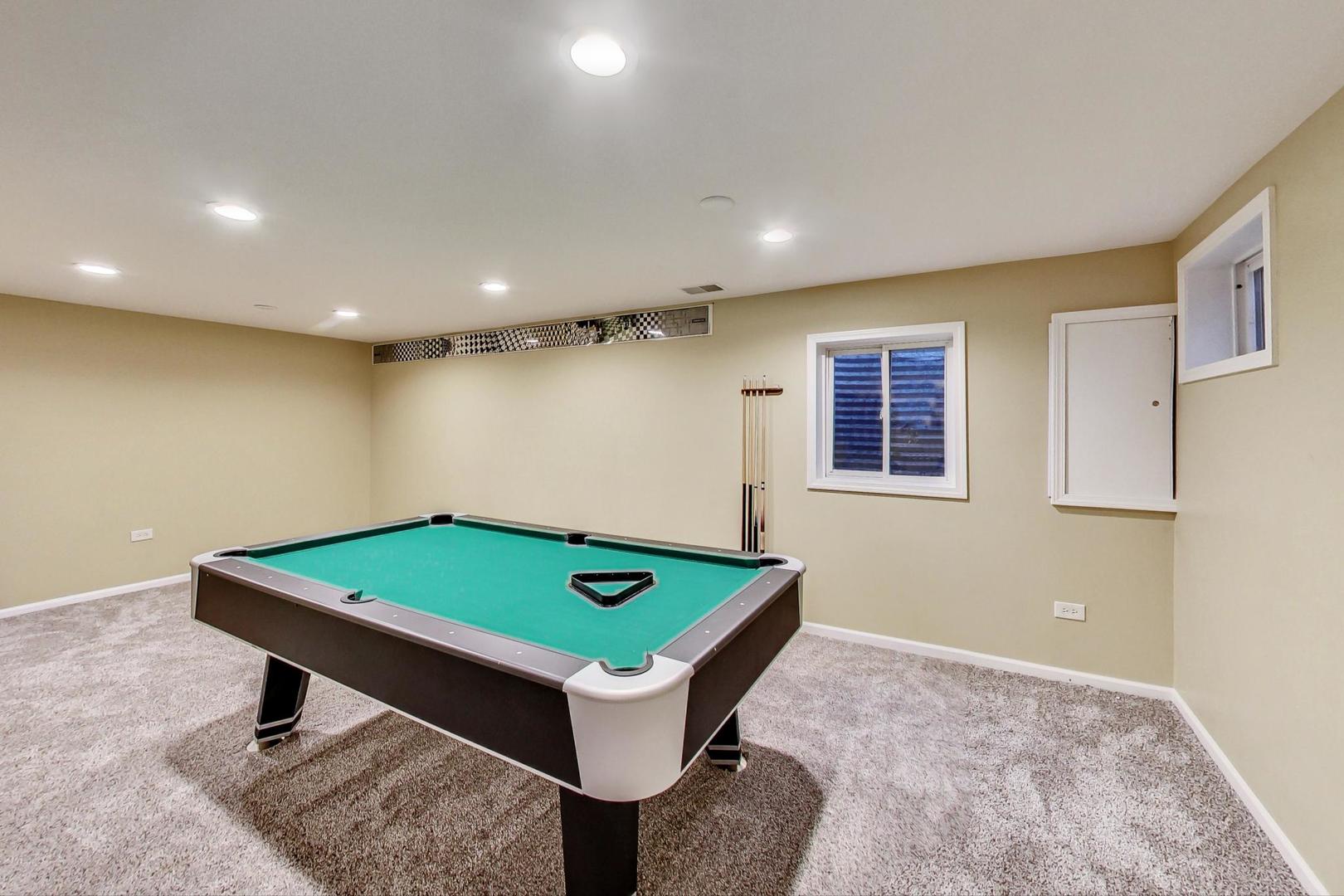 2185 Maplewood Drive Gurnee, IL 60031 - Photo 42 of 65 a room with pool table and windows