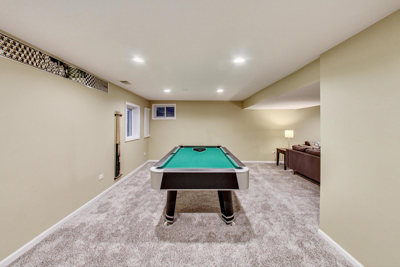 2185 Maplewood Drive Gurnee, IL 60031 - Photo 43 of 65 a room with pool table and outdoor view