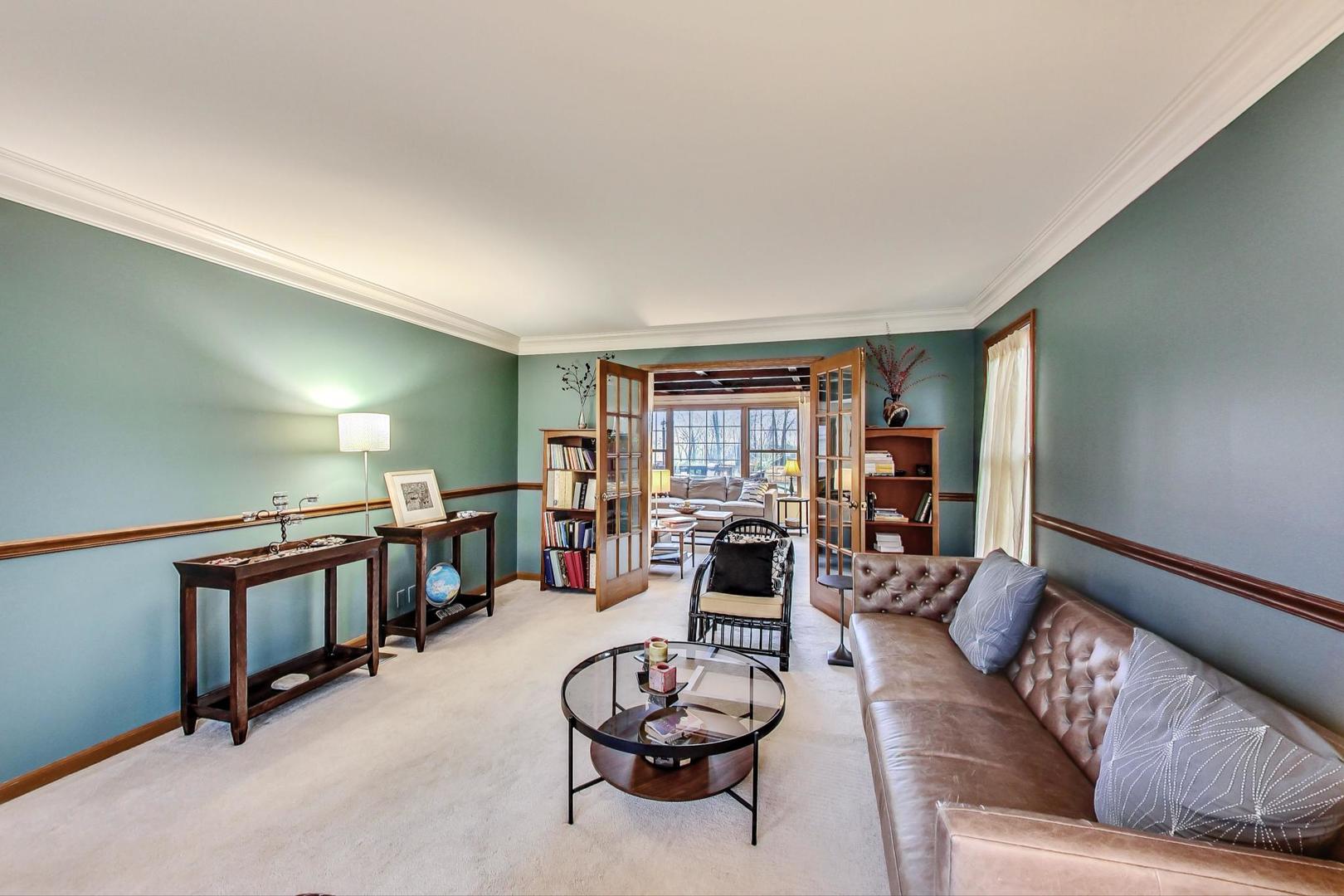 2185 Maplewood Drive Gurnee, IL 60031 - Photo 6 of 65 a living room with furniture and a wooden floor