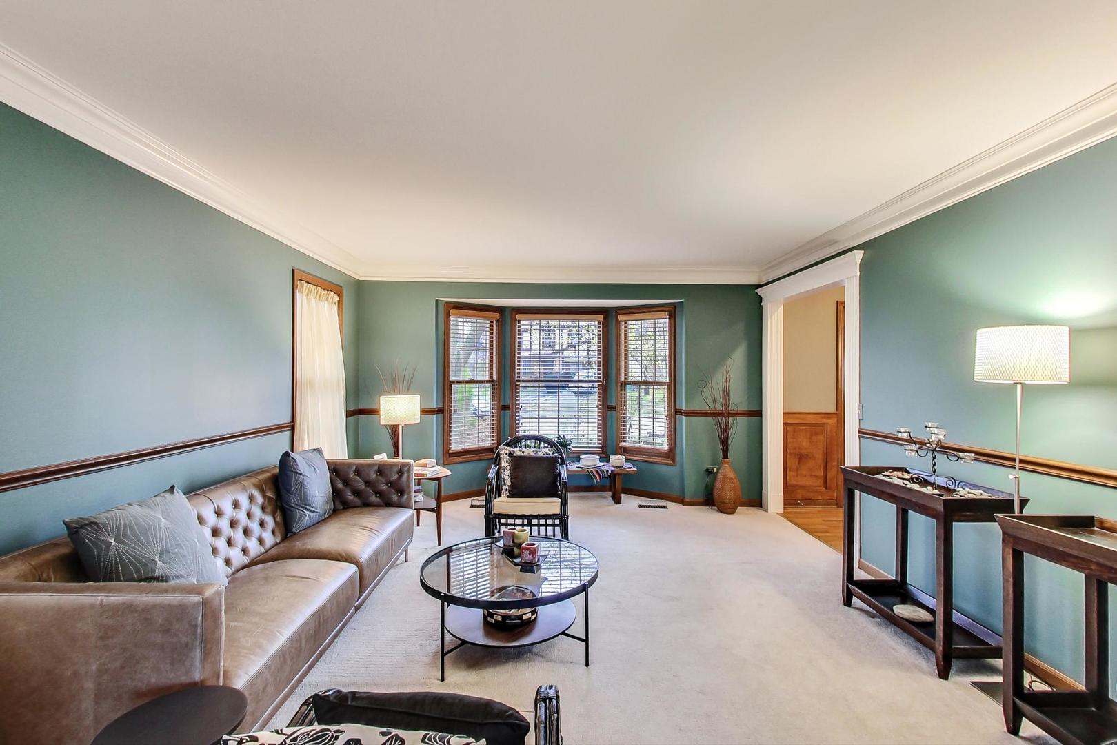 2185 Maplewood Drive Gurnee, IL 60031 - Photo 7 of 65 a living room with furniture and a window