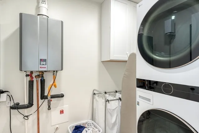 a bathroom with a sink a mirror and shower