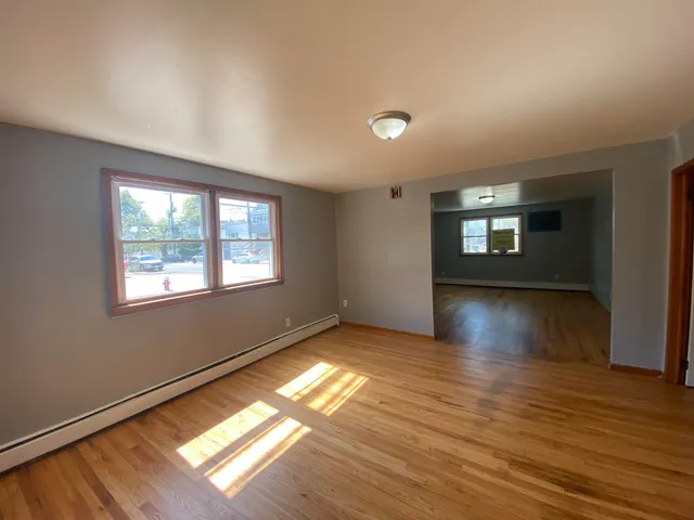 a view of an empty room and window